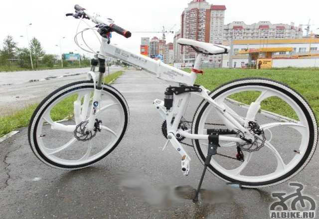 Велосипед на литых дисках БМВ x3 24 скорAltus Нали